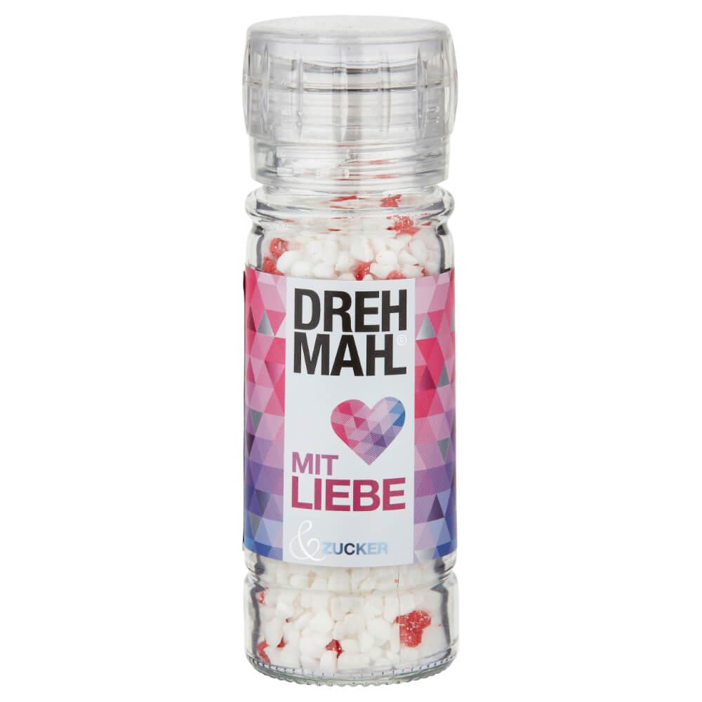 DREHMAHL© mit Liebe: Entdecken Sie die DREHMAHL©-Aromamühle, gefüllt mit Vanille-Hagelzucker und kleinen rosa Zuckerherzen –...