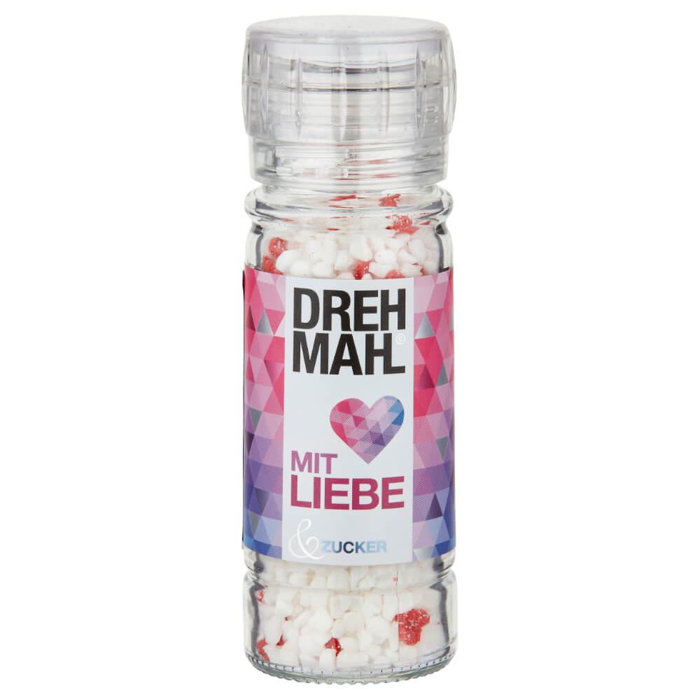 DREHMAHL© mit Liebe: Entdecken Sie die DREHMAHL©-Aromamühle, gefüllt mit Vanille-Hagelzucker und kleinen rosa Zuckerherzen –...