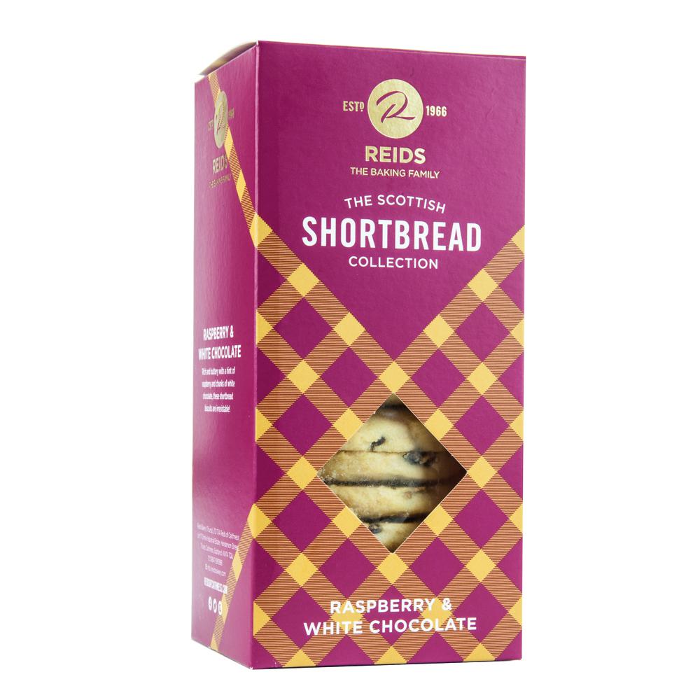 Packung Reids The Scottish Shortbread Collection Raspberry & White Chocolate, magenta mit Rauten-Muster, Produktansicht durch Fenster sichtbar.