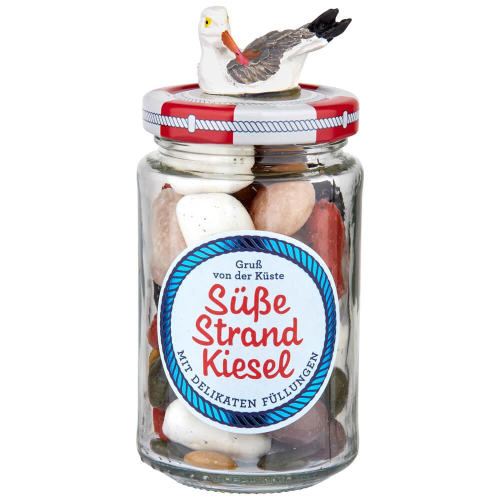 Süße Strandkiesel -Möwe-: Diese einzigartigen Dragees, geformt wie kleine Kieselsteine, bringen Ihnen einen Hauch von...