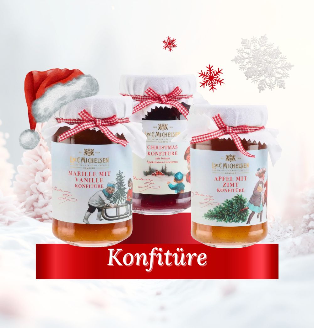 Gläser mit weihnachtlicher Konfitüre von L.W.C. Michelsen: Marille mit Vanille, Christmas Konfitüre und Apfel mit Zimt, dekorativ arrangiert mit Schneeflocken.