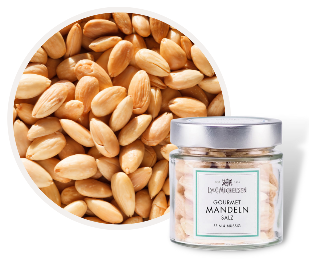 Ein Glas L.W.C. Michelsen Gourmet Mandeln mit Salz neben einer Nahaufnahme der Mandeln.