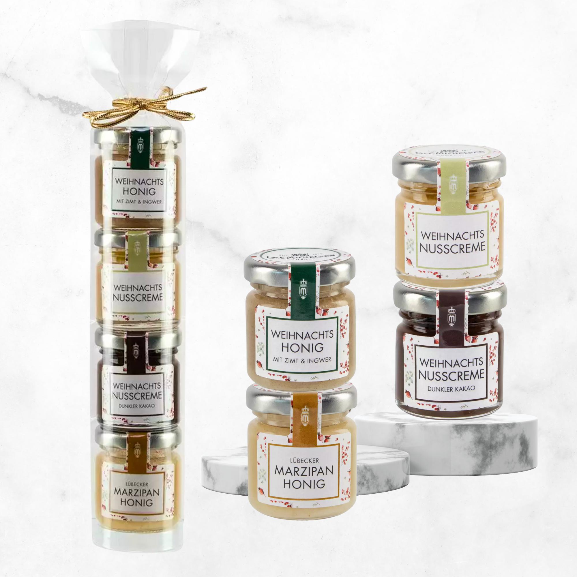 Ein Set mit Weihnachts-Honig und Nusscreme, ideal als Geschenk. Enthält Marzipan-Honig, Honig mit Zimt und Ingwer, sowie verschiedene Nusscremes.