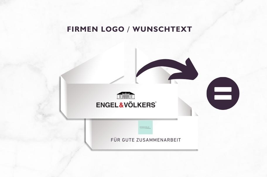 Weiße Grußkarte mit dem Logo von Engel & Völkers und der Aufschrift 'Für gute Zusammenarbeit' vor einem Marmorhintergrund
